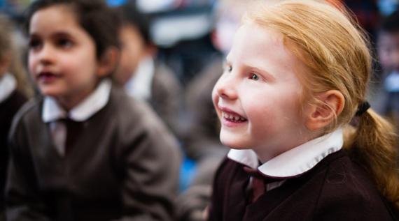 A young girl in class.