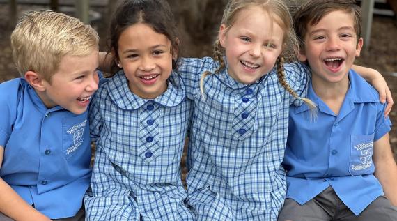 A group of kids laughing together.