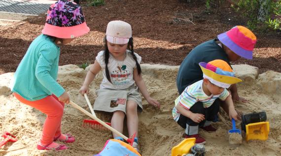 Kids playing in the sand pit.