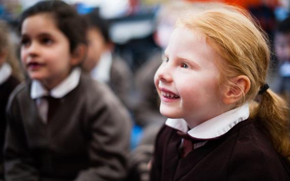 A young girl in class.